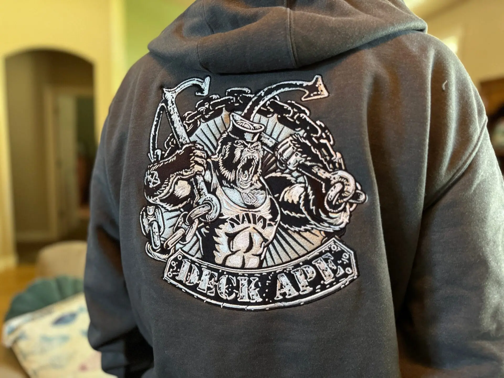 Large embroidered back on a custom hoodie t-shirt for an army vet from The Print Plug in Nampa